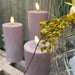 Real Flame 3D LED Stumpenkerze 10x10cm Lila Echtwachs flackernde Kerze