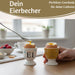 KI-generiertes Bild,Eierbecher Echt-Gold Spruch "Weich Ei" Gute Laune Eierhalter