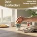 KI-generiertes Bild,Eierbecher Echt-Gold Spruch "Guten Appetit" Gute Laune Eierhalter