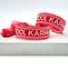 Canvas Statement Armband Cool Karma Rot Quasten besticktes Webarmband