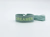 Canvas Statement Armband Dreamer Grün Salbei Quasten besticktes Webarmband