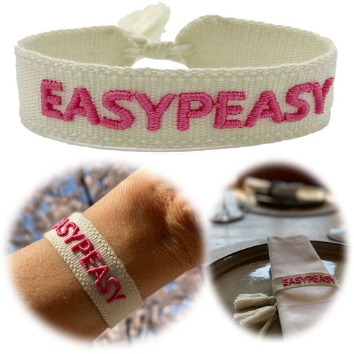 KI-generiertes Bild Canvas Statement Armband EasyPeasy Creme Pink Quasten besticktes Webarmband