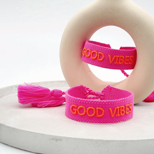 Canvas Statement Armband Good Vibes Neon Pink Orange Quasten besticktes Webarmband