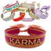 KI-generiertes Bild Canvas Statement Armband Karma Magenta Gold Quasten besticktes Webarmband