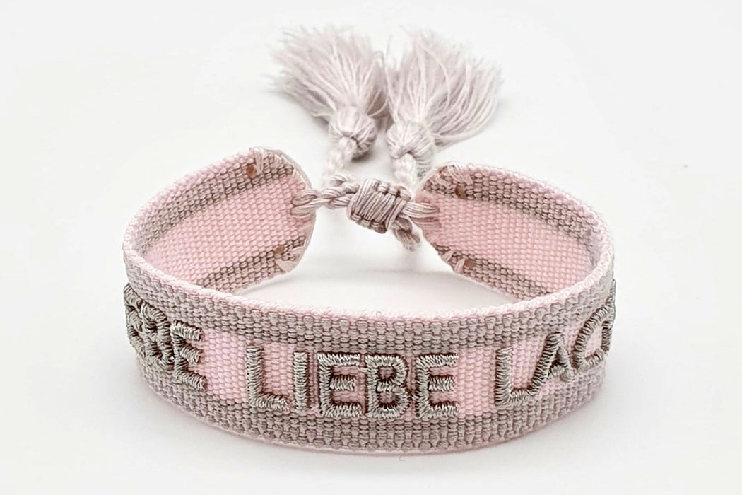 Canvas Statement Armband Lebe Liebe Lache Rosa Quasten besticktes Webarmband