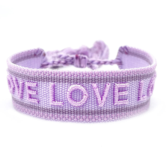 KI-generiertes Bild,Canvas Statement Armband Love Lila Flieder Quasten besticktes Webarmband