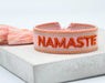Canvas Statement Armband Namaste Rosa Orange Quasten besticktes Webarmband