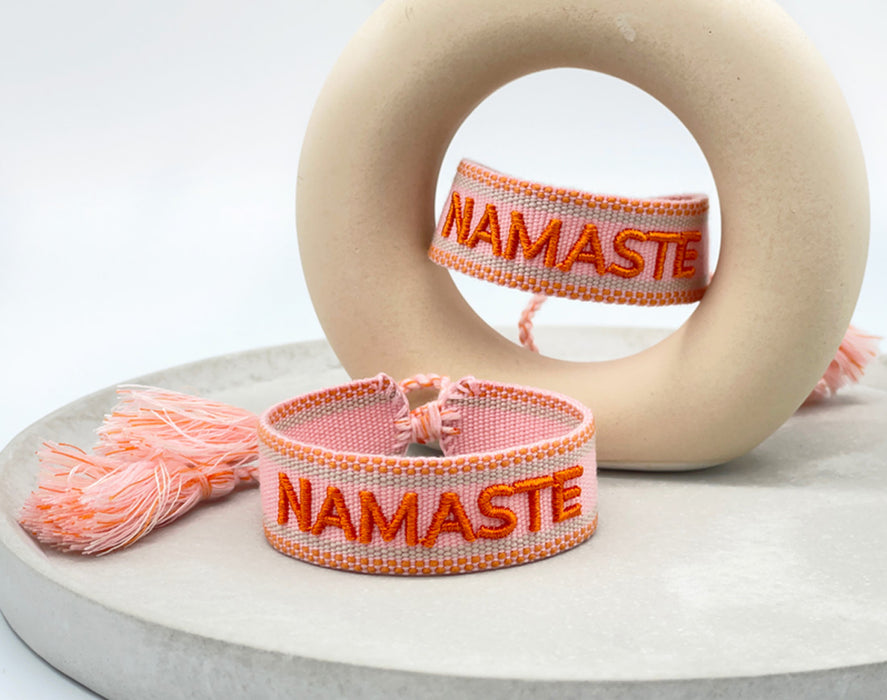 Canvas Statement Armband Namaste Rosa Orange Quasten besticktes Webarmband