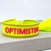 Canvas Statement Armband Optimistin Neon Gelb Pink Quasten besticktes Webarmband