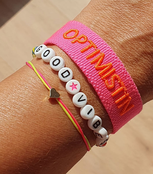 Canvas Statement Armband Optimistin Neon Pink Orange Quasten besticktes Webarmband