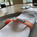 Canvas Statement Armband Smile Orange Türkis Quasten besticktes Webarmband