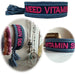 Canvas Statement Armband Need Vitamin Sea Blau Pink Quasten besticktes Webarmband