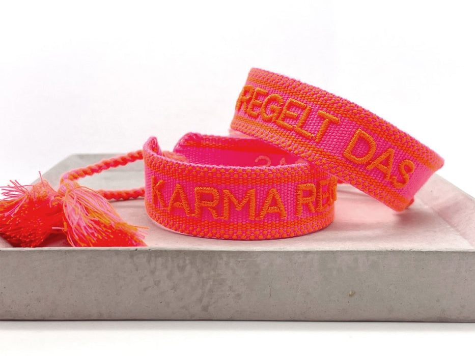 Canvas Statement Armband Karma regelt das Neon Pink Orange Quasten besticktes Webarmband