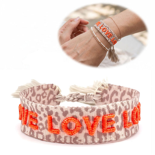 KI-generiertes Bild Canvas Statement Armband Love Leo Leopard Neon Orange Quasten besticktes Webarmband