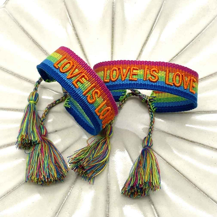Canvas Statement Armband Love is Love Regenbogen Quasten besticktes Webarmband